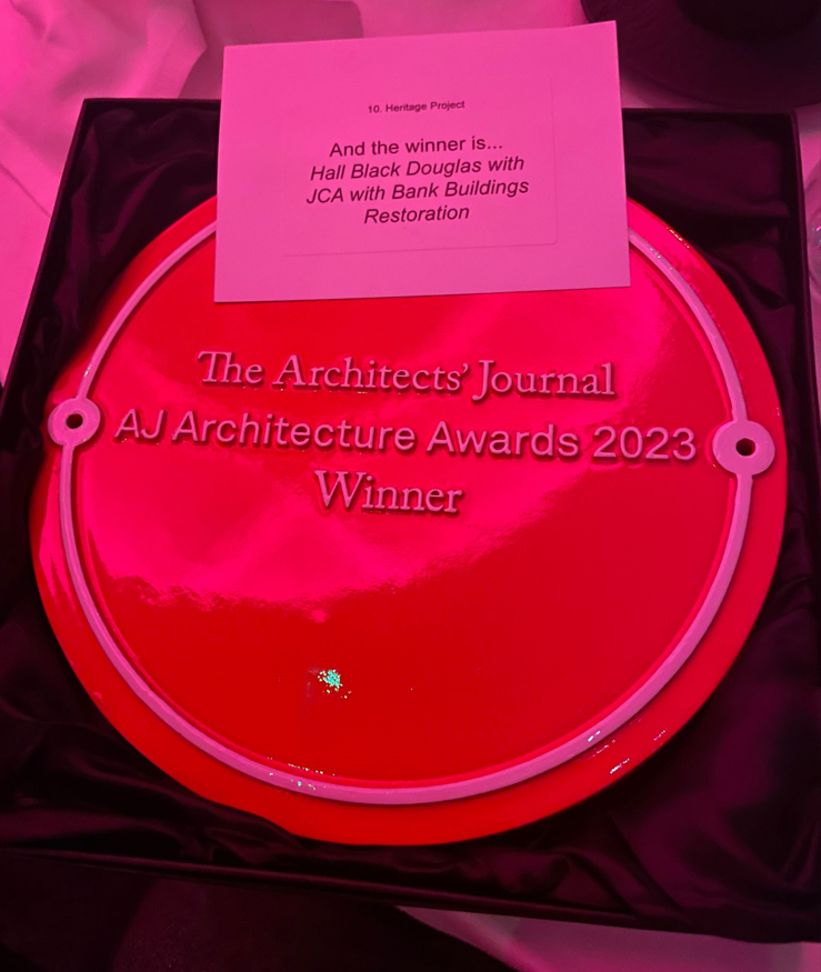 AJ awards winning trophy