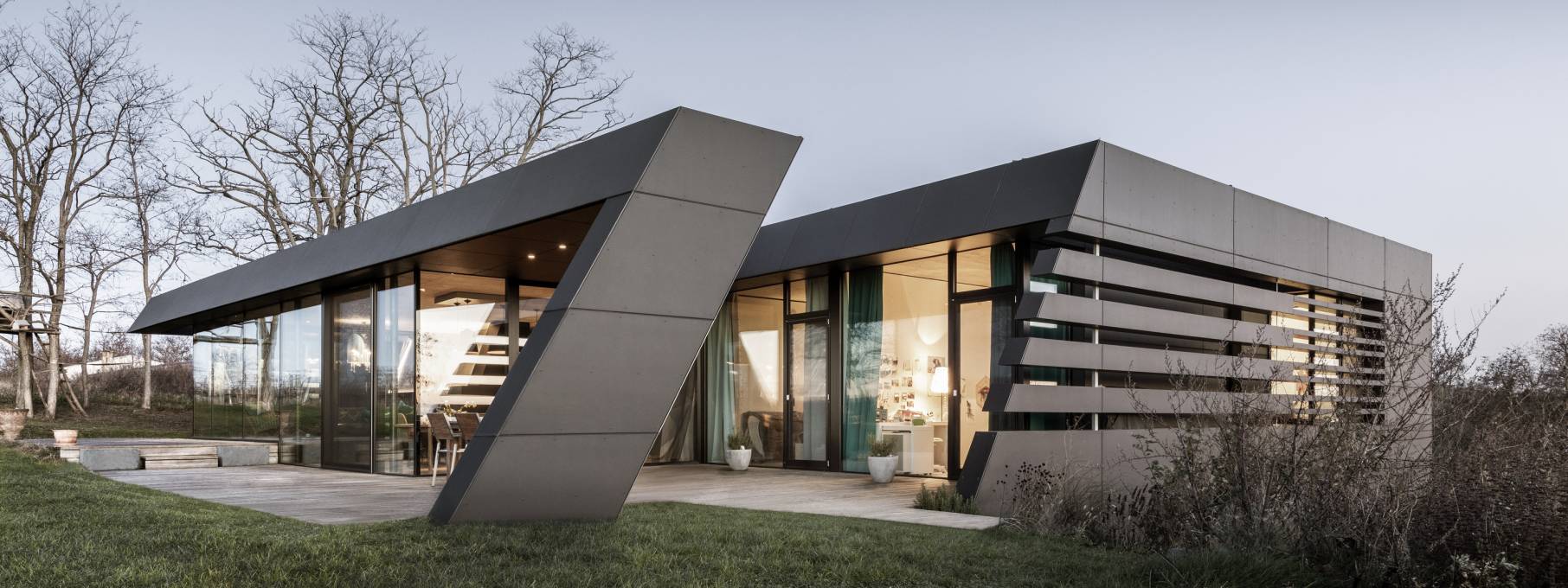 Darkly dramatic and deconstructed House RnEve, Mönchhof, Austria