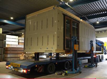 Prefab-woningen-transport-Swisspearl-Windstopper