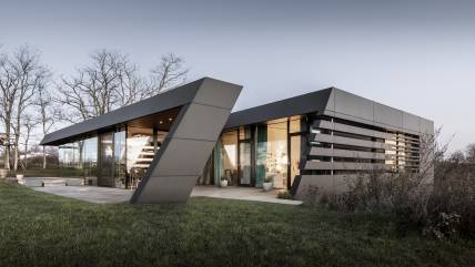 Darkly dramatic and deconstructed House RnEve, Mönchhof, Austria