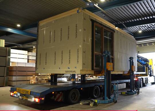 Prefab-woningen-transport-Swisspearl-Windstopper