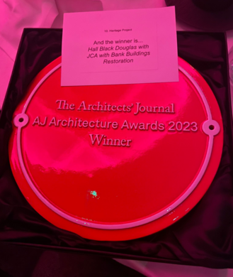 AJ awards winning trophy